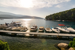Motorboats at the jetty in picturesque bay Osor on the island of Losinj in the Adriatic Sea Croatia
