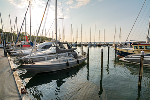 Sailing boats in a marina Langballigau during sunset at the Baltic Sea in Northern Germany