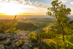 Sunset on a rock ledge in the Swabian Alps