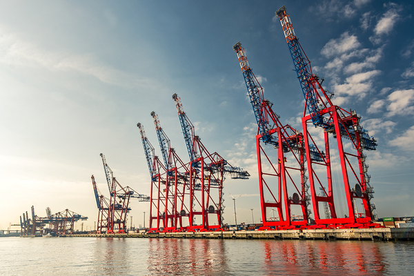 Cranes at a container terminal in the port area of Hamburg Germany Print