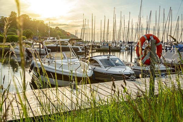 Sunset over pier and marina in Langballigau at the Baltic Sea in Northern Germany Print