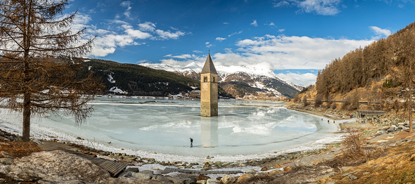 Panorama shot of flooded church tower in Lake Reschen Reschensee in South Tyrol Italy Print