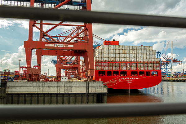 Ship unloading at a container terminal in the port area of Hamburg Germany Print