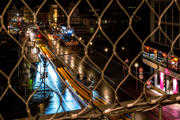 Night shot of blurred car lights on a main street in Tübingen Print