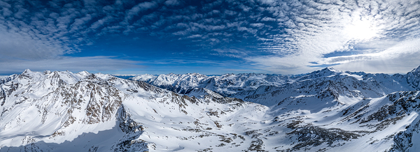 High res aerial panorama shot of scenic snowy mountain range in winter in the European Alps Print