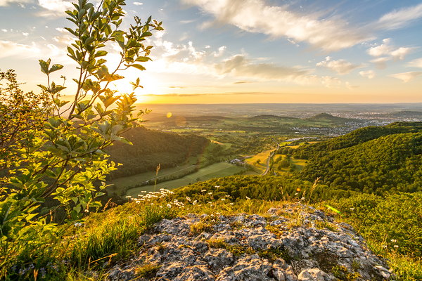 Beautiful sunset over a rock ledge Wackerstein in the Swabian Alps in Southern Germany Print
