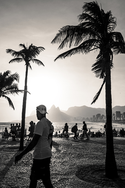 Black and white photo of people strolling along the promenade at Ipanema Beach in Rio de Janeiro  Print