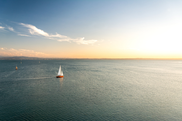 Lonely sailing boat on Lake Constance Print