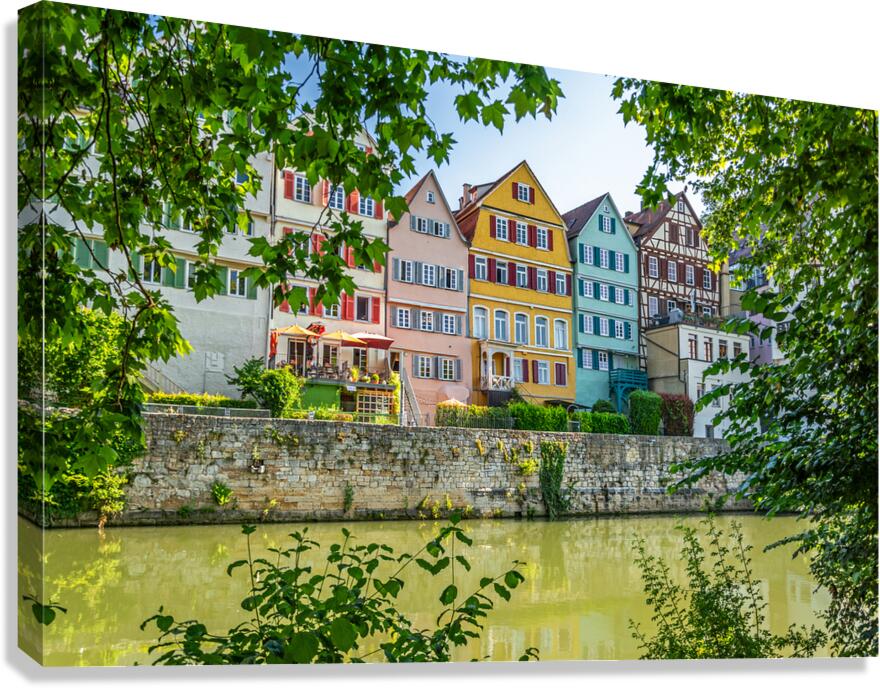 Traditional colourful half-timbered houses at the riverfront of Tübingen Germany  Canvas Print