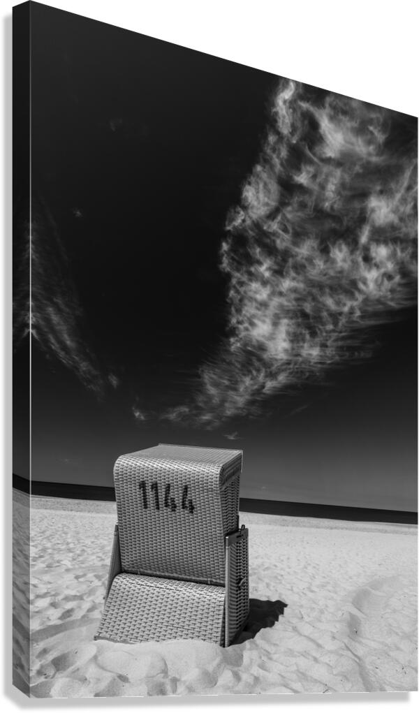 Black and white shot of beach chair at the North Sea on the island of Sylt  Canvas Print