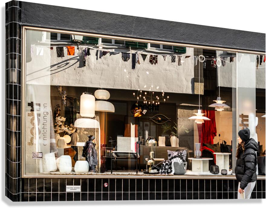 Street photo of reflections in a stylish furniture shop window in the city Canvas Print