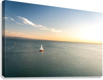 Lonely sailing boat on Lake Constance Canvas Print