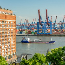 View of the Burchardkai container terminal and ship from Hamburg Övelgönne Germany