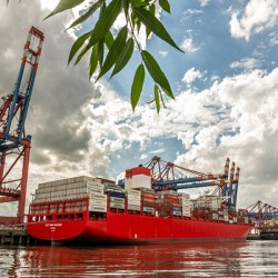 Huge container vessel unloading at the Eurogate container terminal in Hamburg Waltershof
