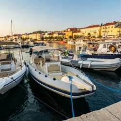 Boats at sunset in the marina of Mali on the island of Losinj in the Adriatic Sea Croatia