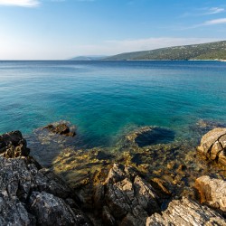 Rock formations in a beautiful bay at the Adriatic Sea on the island of Losinj in Croatia