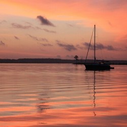 Sailboat At Dusk