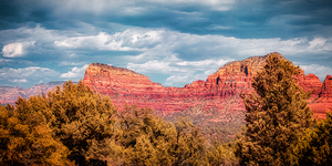 Crimson Landscapes Under Spirited Skies 