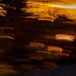 Abstract image featuring orange light and shadows 1