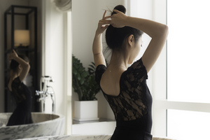 Ballerina portrait in a bathroom
