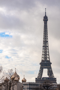 Eiffel tower and Sainte-Trinite cathedral in paris