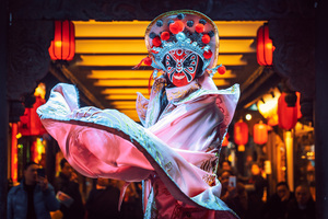 Chinese actress performs a traditional face-changing show