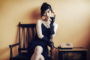 Young Chinese woman vintage studio portrait