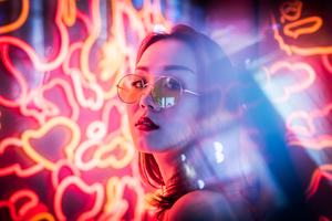 Young Chinese woman portrait with neon lights