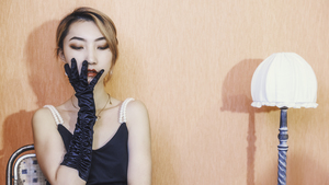 Young Chinese woman vintage studio portrait