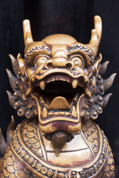 Dragon bronze statue in a chinese buddhist temple Print