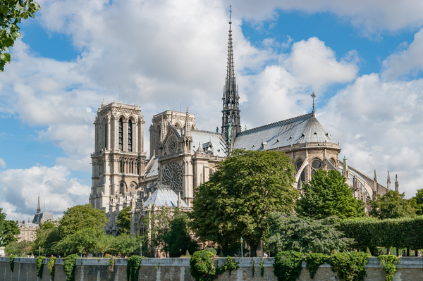 Notre Dame de Paris against blue sky by Philippe Lejeanvre