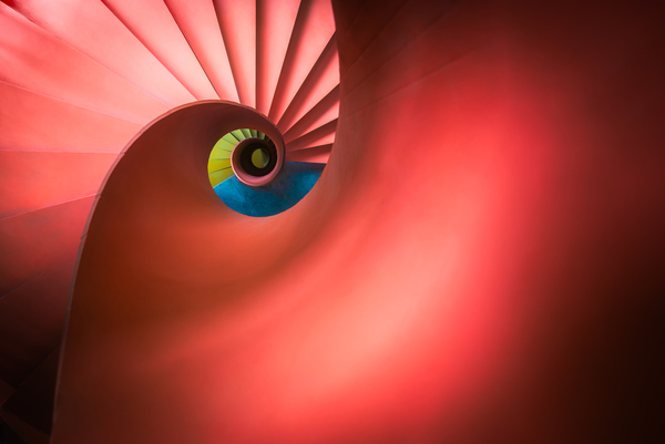 Red spiral staircase by Philippe Lejeanvre