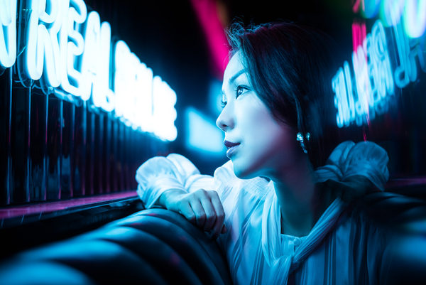 Young Chinese woman portrait with neon lights Print
