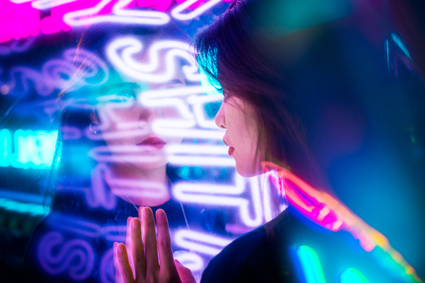 Young Chinese woman portrait with neon lights Print