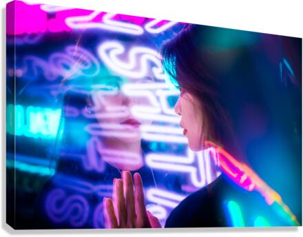 Young Chinese woman portrait with neon lights Canvas Print