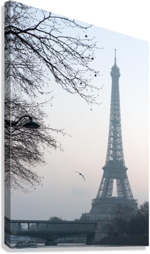 Eiffel tower early morning in the haze  Canvas Print