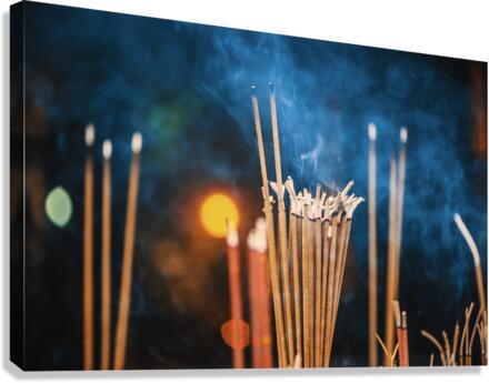 Incense sticks burning with smoke Canvas Print