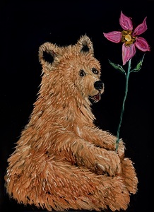IMG 4223.grizzly bear  holding pink flower