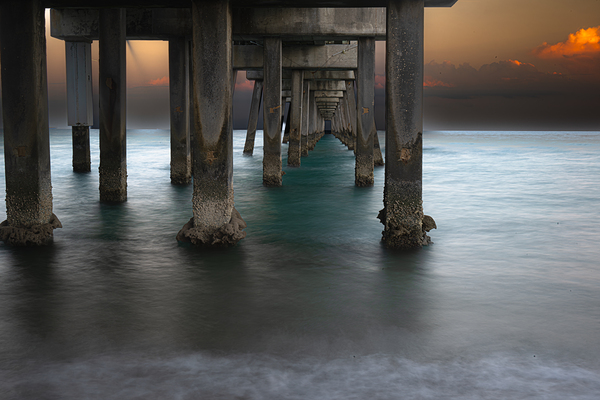 sunrise under the pier