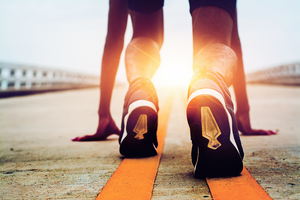 athletes are starting road with morning sunshine