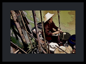 WOMAN VENDOR AT A FLOATING MARKET IN THAILAND 02