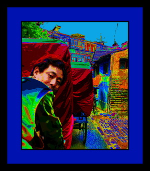 OUR RICKSHAW GUIDE WHILE TOURING A HUTONG AREA IN BEIJING