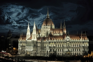 Clouds over illuminated Hungarian Parliament at n 1722607510.0456