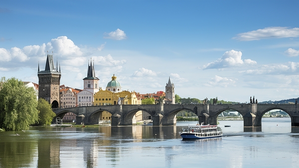 Touristic boat near the Charles bridge in Prague. Print