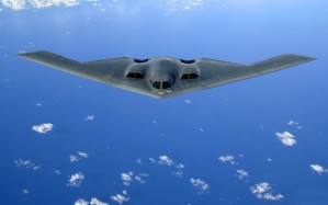 A B-2 Spirit soars through the sky after a refueling mission.