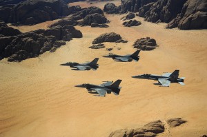 Military planes flying over the Wadi Rum desert in Jordan.
