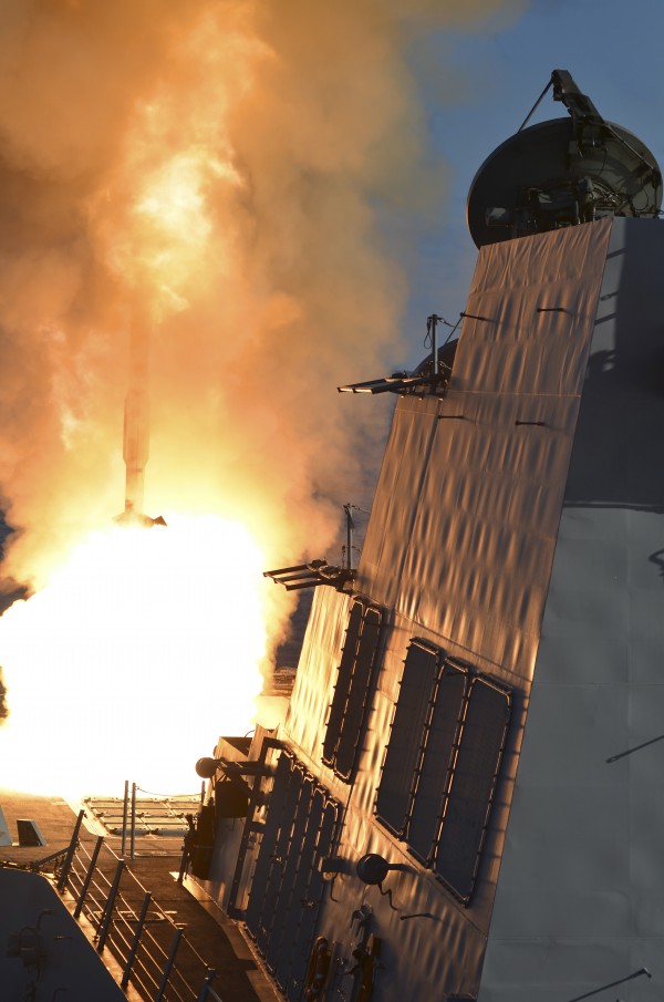 USS Michael Murphy fires an RIM-66M SM-2 missile. by StocktrekImages