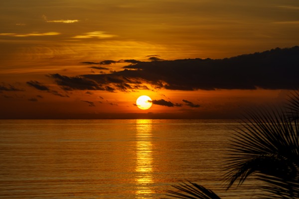 Sunrise at Cayman Kai by tommikee