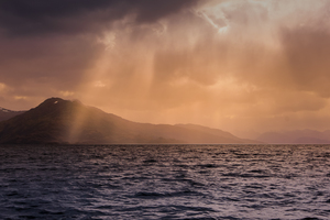 Sun peaking through rain clouds