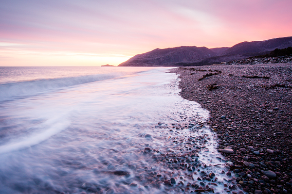 Sunrise at LeButtereau Beach by Roman Buchhofer